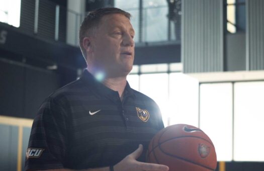 Basketball Coach Mike Rhoads with Basketball