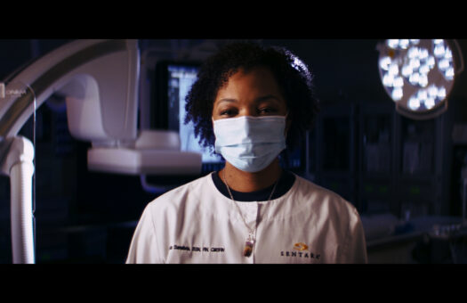 Nurse in front of Medical Scanner