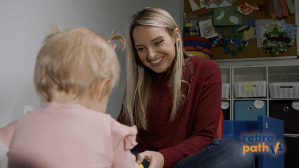 Woman plays with autistic child at Comprehensive Autism Partners